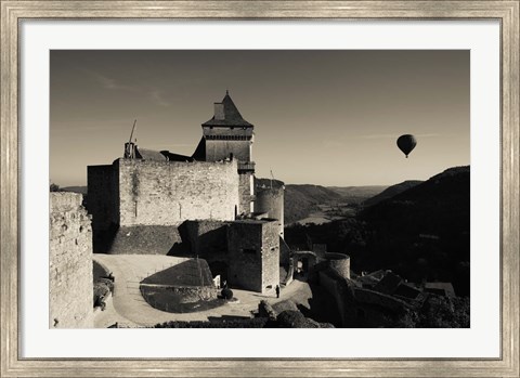 Framed Chateau de Castelnaud with hot air balloon flying over a valley, Castelnaud-la-Chapelle, Dordogne, Aquitaine, France Print