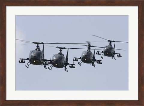 Framed Serbian Air Force Soko SA-342L GAMA choppers in flight over Serbia Print
