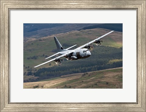 Framed C-130 Hercules of the Royal Air Force flying over North Wales Print