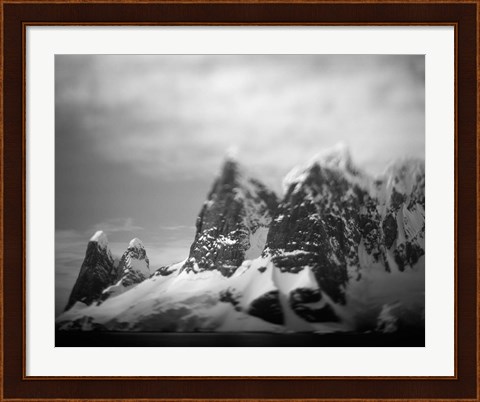 Framed Antarctica, Mountain peaks along Cape Renaud in Lemaire Channel. Print