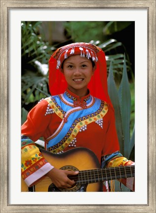 Framed Ethnic Dancer Playing Guitar, Kunming, Yunnan Province, China Print