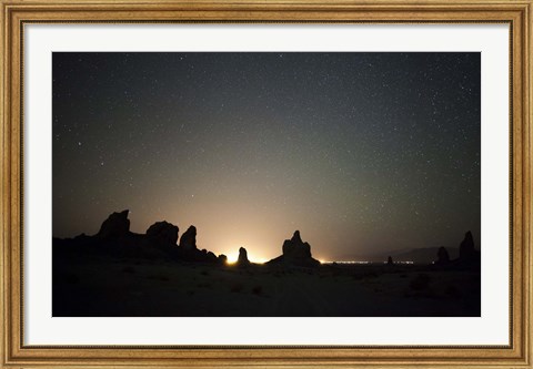 Framed Large tufa formations at Trona Pinnacles against a backdrop of stars Print