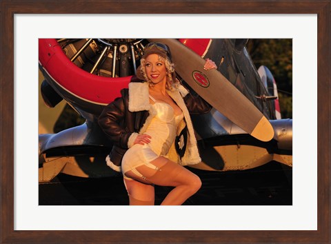 Framed 1940&#39;s pin-up girl posing with a vintage T-6 Texan aircraft Print