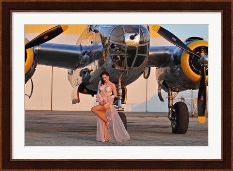 Framed Sexy 1940&#39;s pin-up girl in lingerie posing with a B-25 bomber Print