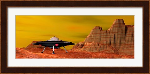 Framed UFO landing on a desert landscape Print