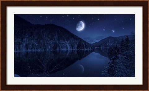 Framed Moon rising over tranquil lake in the misty mountains against starry sky Print