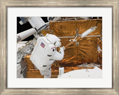 Framed Astronaut works with the Hubble Space Telescope in the cargo bay of Atlantis Print
