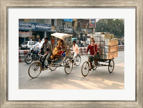 Framed People and cargo move through streets via rickshaw, Varanasi, India Print