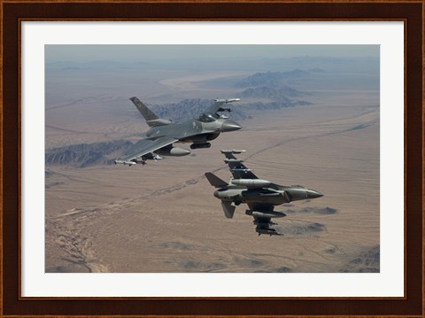 Framed Two F-16&#39;s on a training mission over the Arizona desert Print