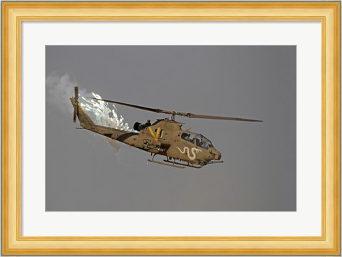 Framed AH-1S Tzefa of the Israeli Air Force dispenses flares Print
