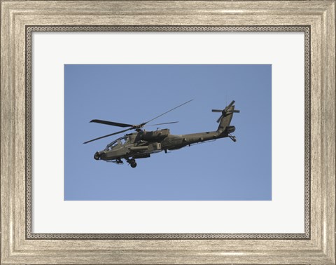 Framed AH-64 Apache in flight over the Baghdad Hotel in central Baghdad, Iraq Print