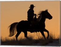 Cowboy Riding His Horse Winters Snow Silhouetted At Sunset Fine Art Print
