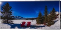 Red Chairs Under a Moonlit Winter Sky at Two Jack Lake Fine Art Print