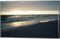 Waves breaking on the beach at sunrise Fine Art Print
