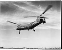 Low angle view of a military helicopter in flight, H-21D Helicopter, US Military Fine Art Print