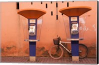Public telephone booths in front of a wall, Morocco Fine Art Print