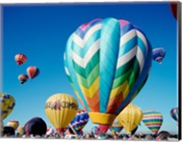Low angle view of hot air balloons taking off, Albuquerque International Balloon Fiesta, Albuquerque, New Mexico, USA Fine Art Print