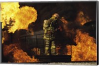 Side profile of a firefighter holding an axe Fine Art Print