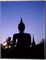 Silhouette of Buddha and temple during sunset, Sukhothai, Thailand Fine Art Print