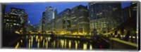 Low angle view of buildings lit up at night, Chicago River, Chicago, Illinois, USA Fine Art Print