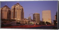 USA, California, Oakland, Alameda County, New City Center, Buildings lit up at night Fine Art Print