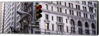 Low angle view of a Red traffic light in front of a building, Wall Street, New York City Fine Art Print