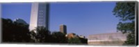 Low angle view of the Devon Tower and Crystal Bridge Tropical Conservatory, Oklahoma City, Oklahoma, USA Fine Art Print