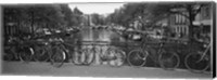 Bicycle Leaning Against A Metal Railing On A Bridge, Amsterdam, Netherlands Fine Art Print