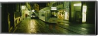 Cable Cars Moving On A Street, Freiburg, Germany Fine Art Print