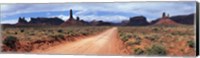 Dirt road through desert landscape with sandstone formations, Utah. Fine Art Print