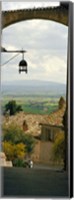 Umbrian countryside viewed through an alleyway, Assisi, Perugia Province, Umbria, Italy Fine Art Print