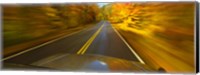 Road viewed through the windshield of a moving car Fine Art Print