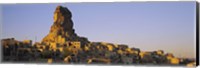 Low angle view of a rock formation in a village, Cappadocia, Turkey Fine Art Print