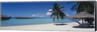 Lounge chair under a beach umbrella, Moana Beach, Bora Bora, French Polynesia Fine Art Print
