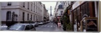 Buildings along a street with the Eiffel Tower in the background, Paris, France Fine Art Print