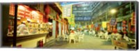 Group of people sitting outside a restaurant, Beijing, China Fine Art Print