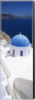High angle view of a church with blue dome, Oia, Santorini, Cyclades Islands, Greece Fine Art Print