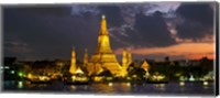 Buddhist temple lit up at dawn, Wat Arun, Chao Phraya River, Bangkok, Thailand Fine Art Print