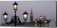 Lampposts lit up at dusk with building in the background, San Giorgio Maggiore, Venice, Italy Fine Art Print