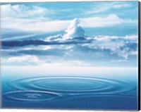 Dramatic cloud formations above rings in deep blue water Fine Art Print