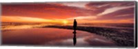 Silhouette of human sculpture on the beach at sunset, Another Place, Crosby Beach, Merseyside, England Fine Art Print
