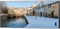 Buildings along snow covered street, Castle Combe, Wiltshire, England Fine Art Print