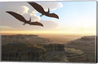 Two Pterodactyl flying dinosaurs soar above a beautiful canyon Fine Art Print