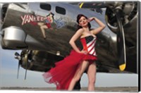 Beautiful 1940's style pin-up girl standing under a B-17 bomber Fine Art Print