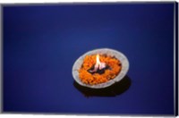 Flower candle in the Ganges River, Varanasi, India Fine Art Print