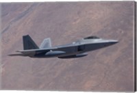 An F-22 Raptor on a Training Mission Fine Art Print