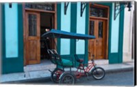 Cuba, Camaquey, bike carriage and buildings Fine Art Print