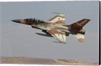 An F-16B Netz of the Israeli Air Force in flight over Israel Fine Art Print