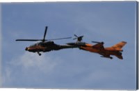 An F-16 Falcon and AH-64 Apache from the Royal Netherlands Air Force Fine Art Print