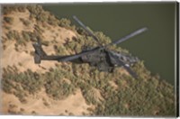 An AH-64D Apache Helicopter in Flight Fine Art Print